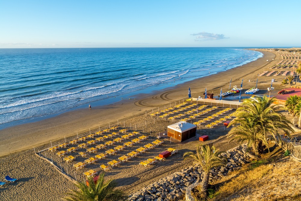 View over the beach of Playa del Ingles on Gran Canaria in Spain at sunrise