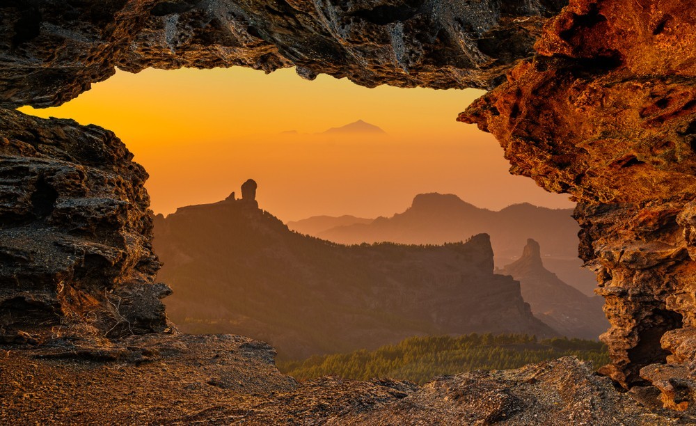 View from natural rock cave at Roque Nublo, Roque Bentaiga-Gran Canaria, Spain