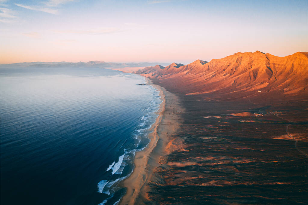 Aerial View Panorama Of Cofete Beach Valley In Fuerteventura shot in the evening time during sunset.