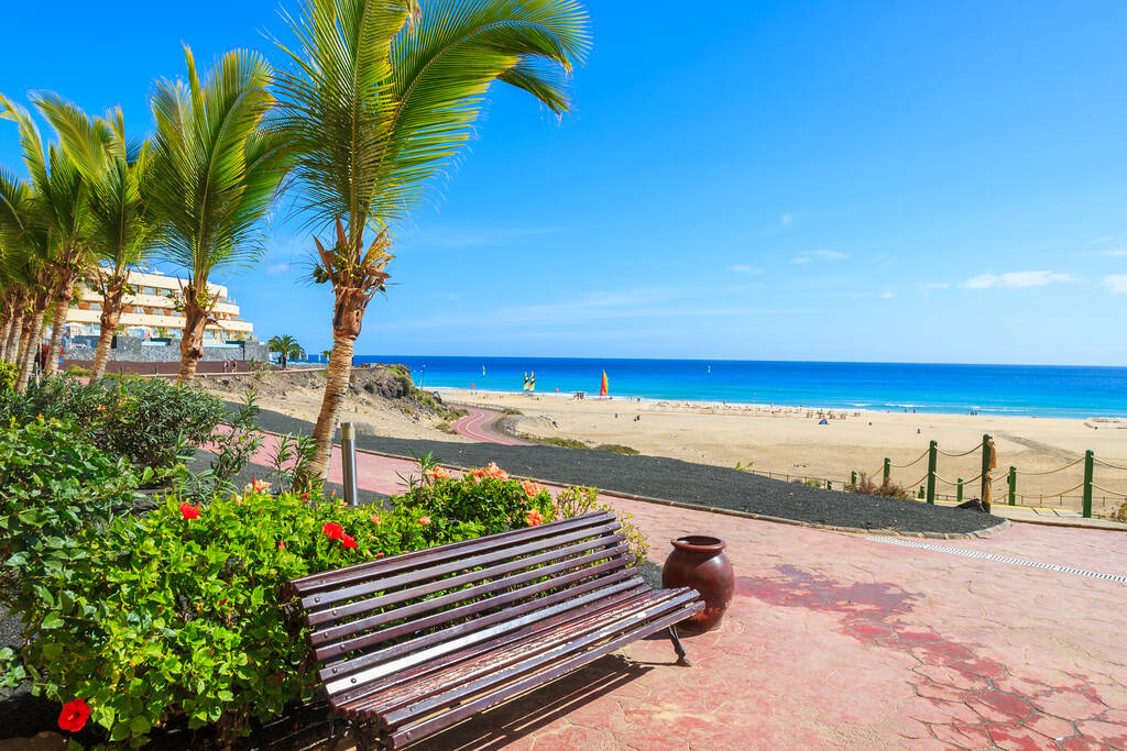 Bench on Morro Jable promenade along beach on Jandia peninsula, Fuerteventura, Canary Islands, Spain 