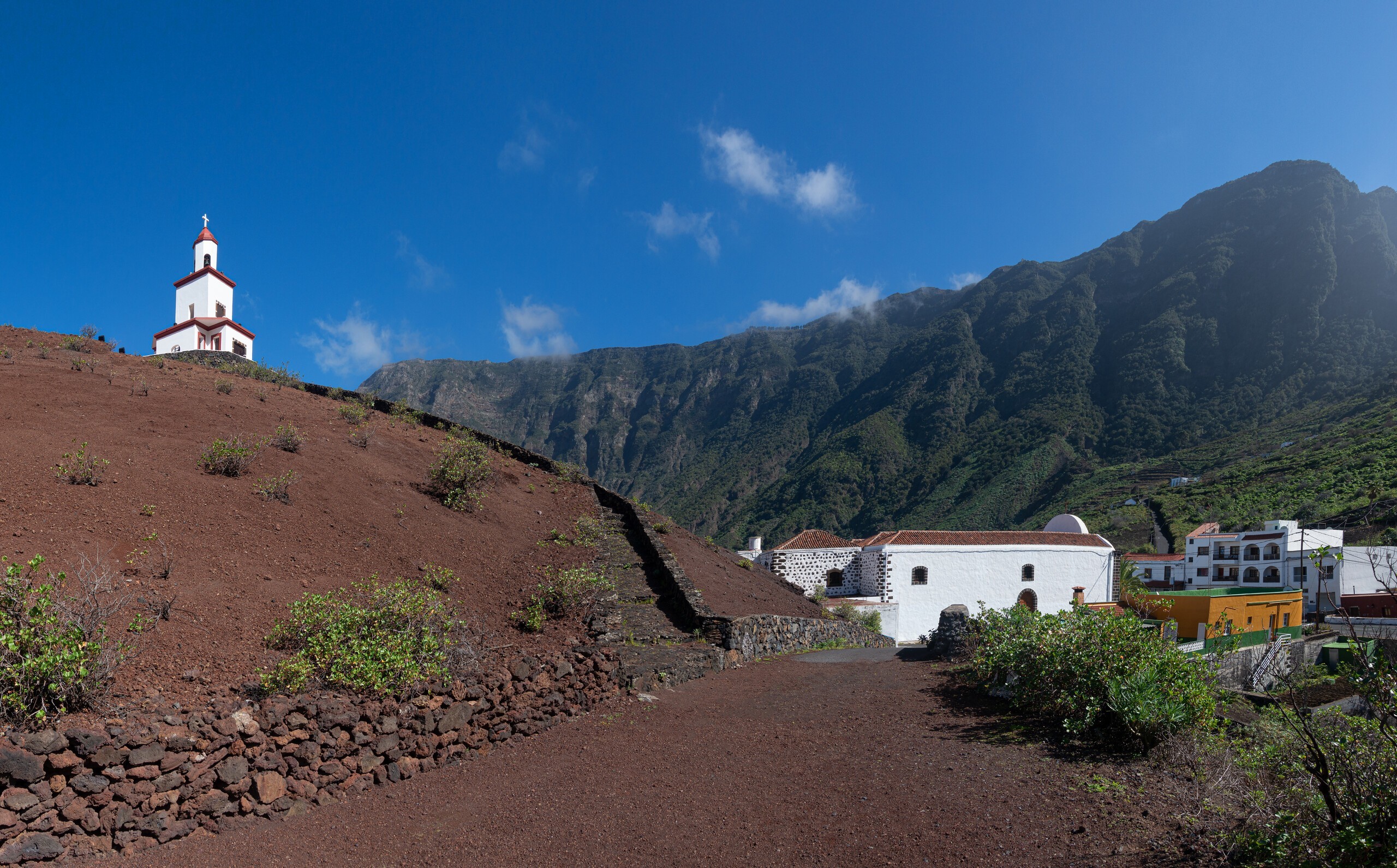 La Frontera, El Hierro - Way to the bell tower behind the church, the landmark of the town in the El Golfo Valley